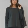 Top made out of travel fabric, Elsewhere tape side slit finishing, back longer, round neck, long sleeves ? Elsewhere Fashion