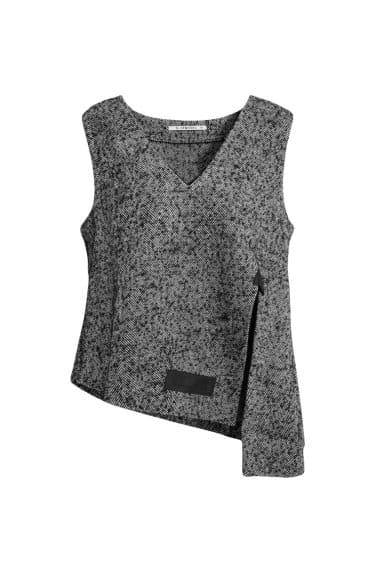 Sleeveless V-neck spencer, front slit, asymmetrical hem, leather Elsewhere patch label ? Elsewhere Fashion
